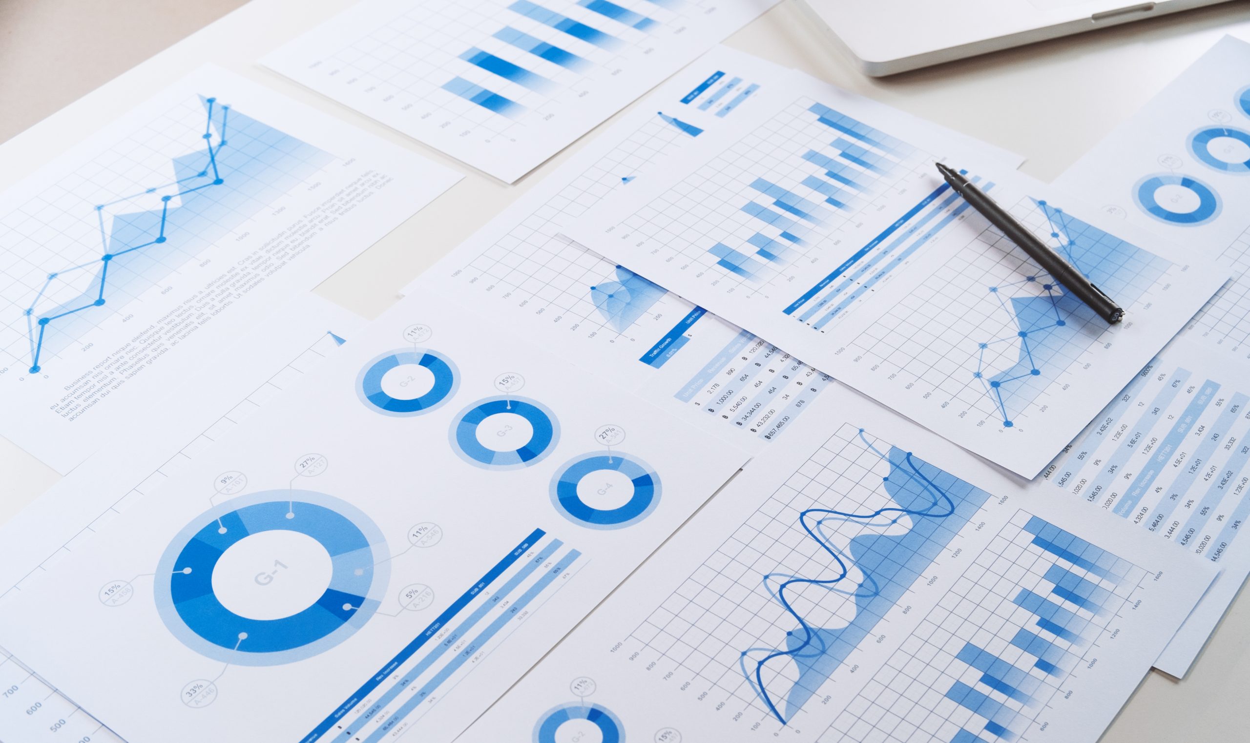 Graphs, pen and laptop
